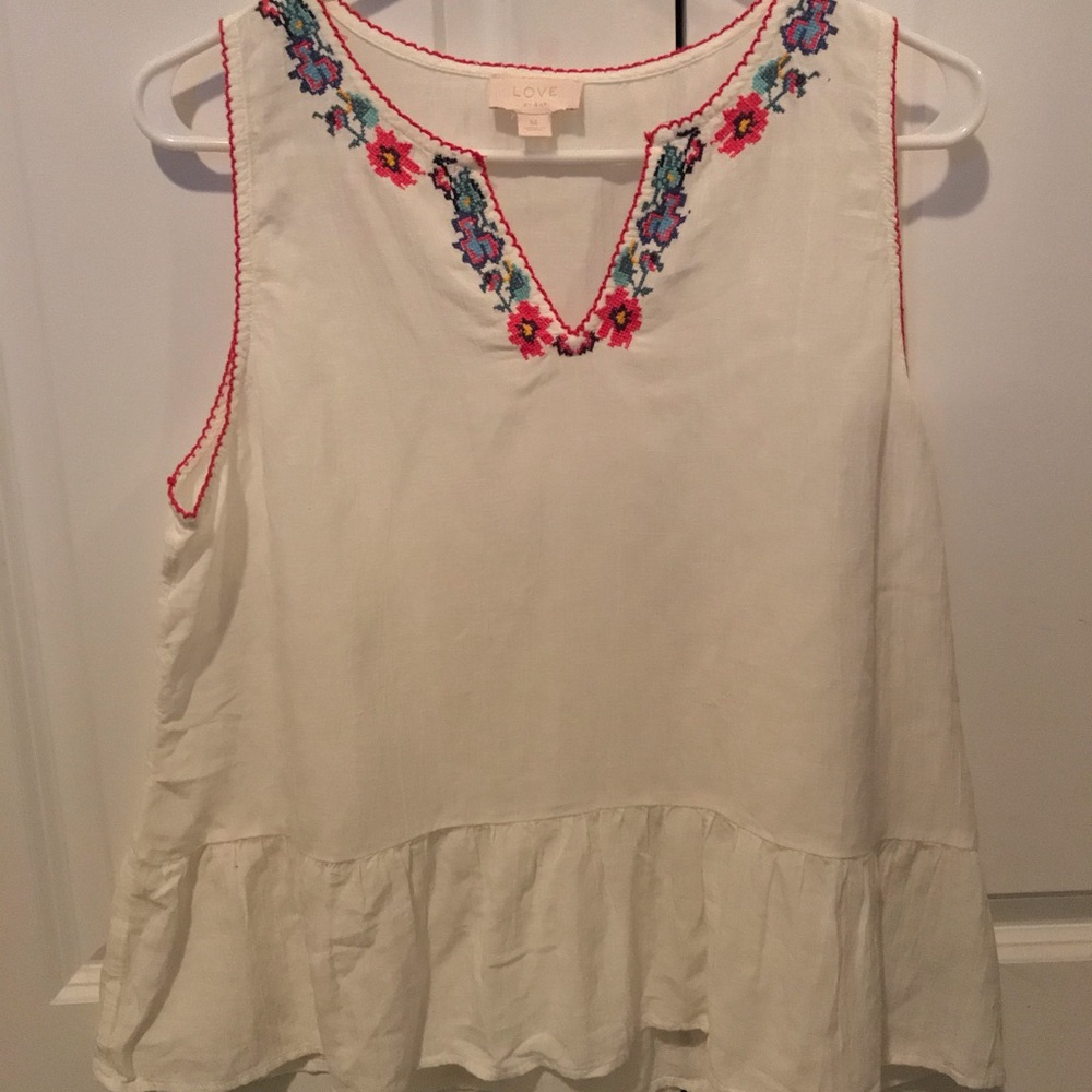 Embroidered Peplum Top